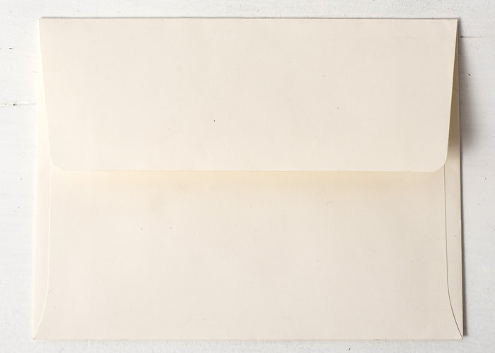 An off-white envelope, included with every card.