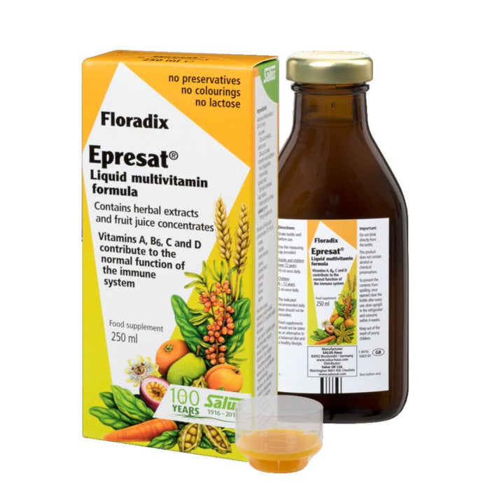 Floradix Epresat Multivitamin packaging and bottle, with the box showing the brand name, vitamins contained, and an indication that it's alcohol-free, preservative-free, coloring-free, and flavoring-free. There is also a picture of carrots, which are listed as an ingredient in the product.
