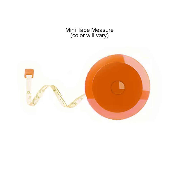 Mini tape measure with orange casing on a white background