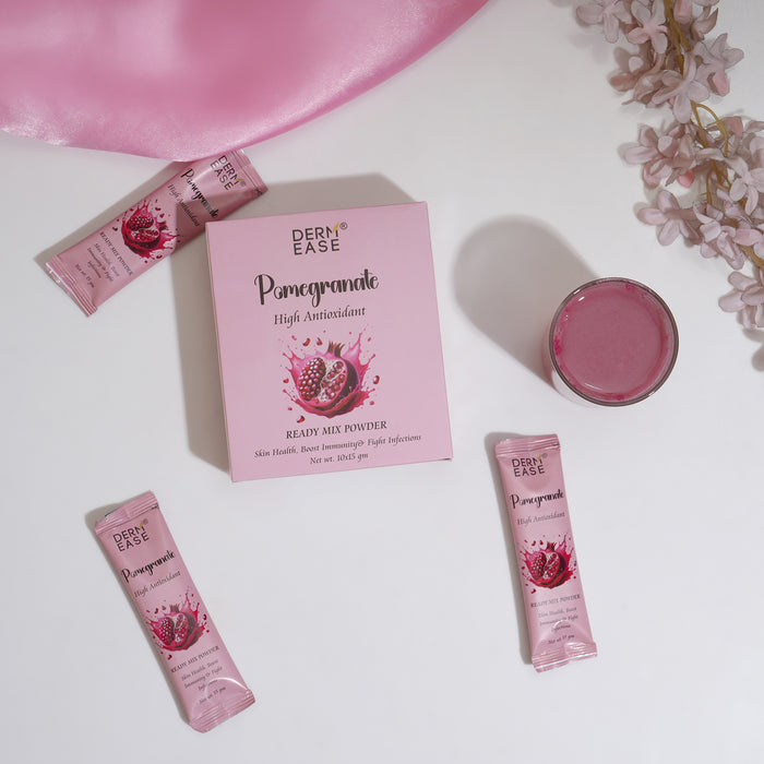 Derm Ease ready-to-mix pomegranate powder packaging with packets and a container on a white background.