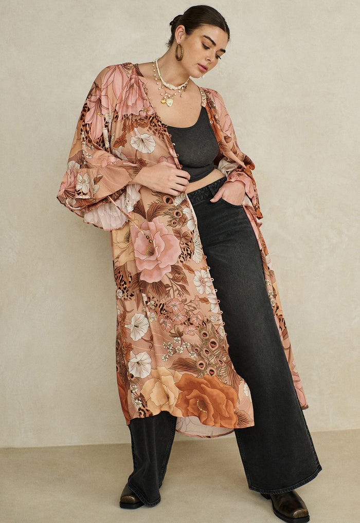 Stealing Beauty Gown in Rose Quartz, front view flat lay showing floral print, button front and ruffle sleeves