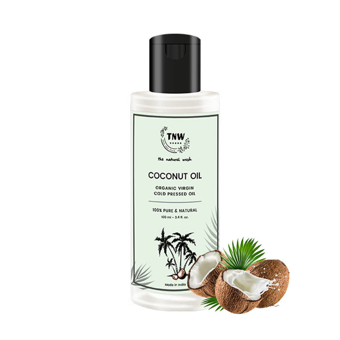 Bottle of coconut oil with a black cap on a white background